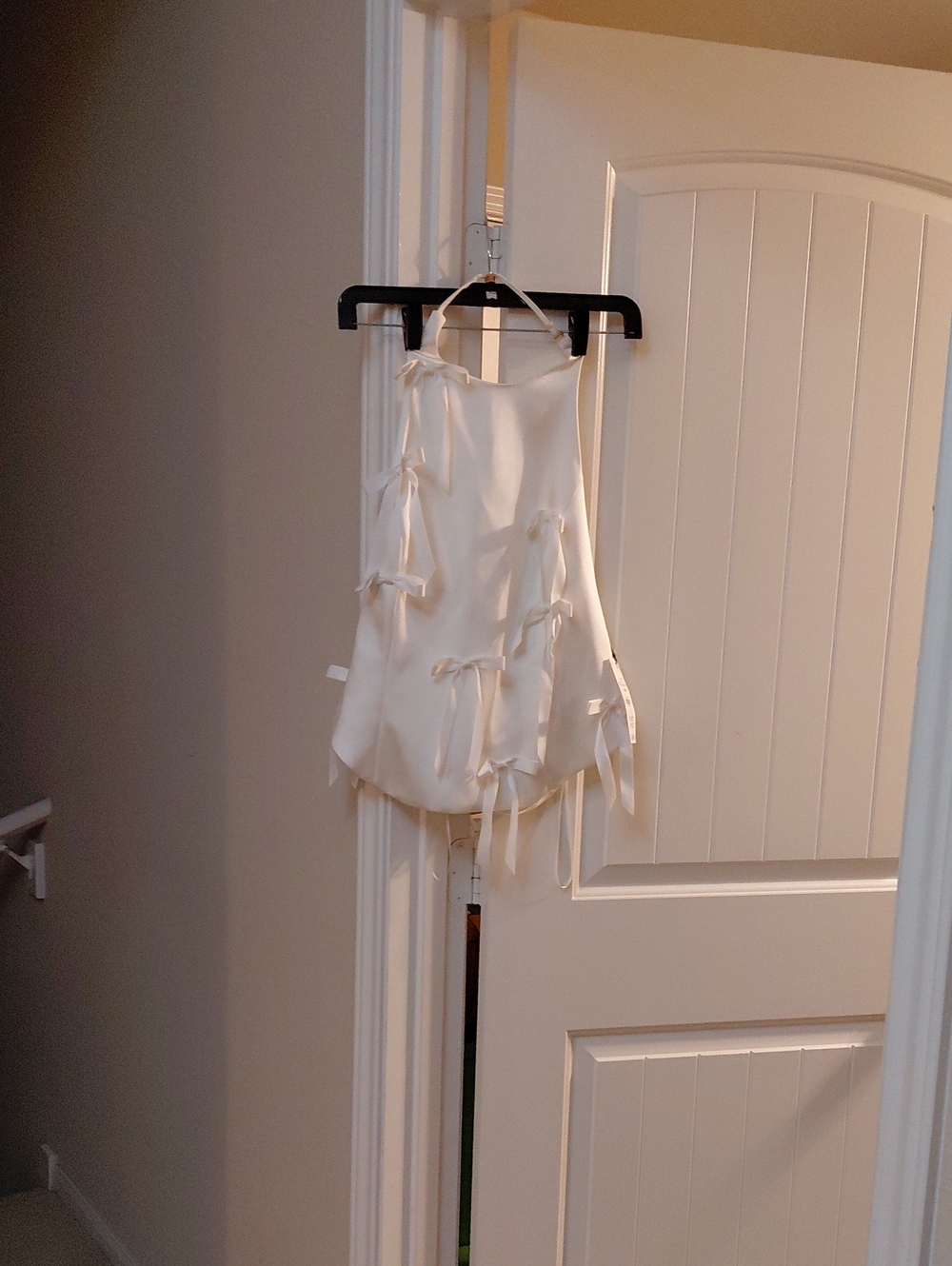 Elegant Ivory Ribbon-Detail Backless Halter Top